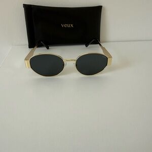 White Fox Boutique Veux Gold Frame oval Sunglasses with Black Lenses